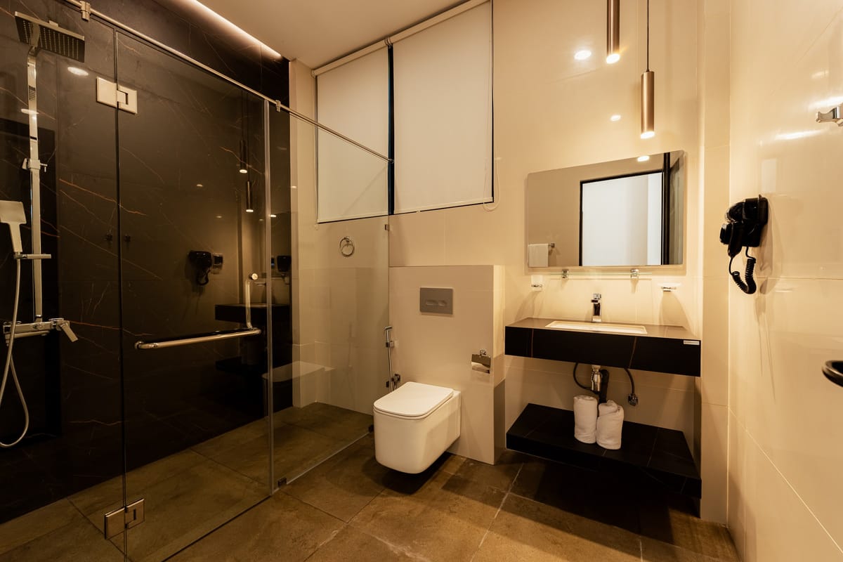 Pool View Room 2 bathroom, glass-walled shower