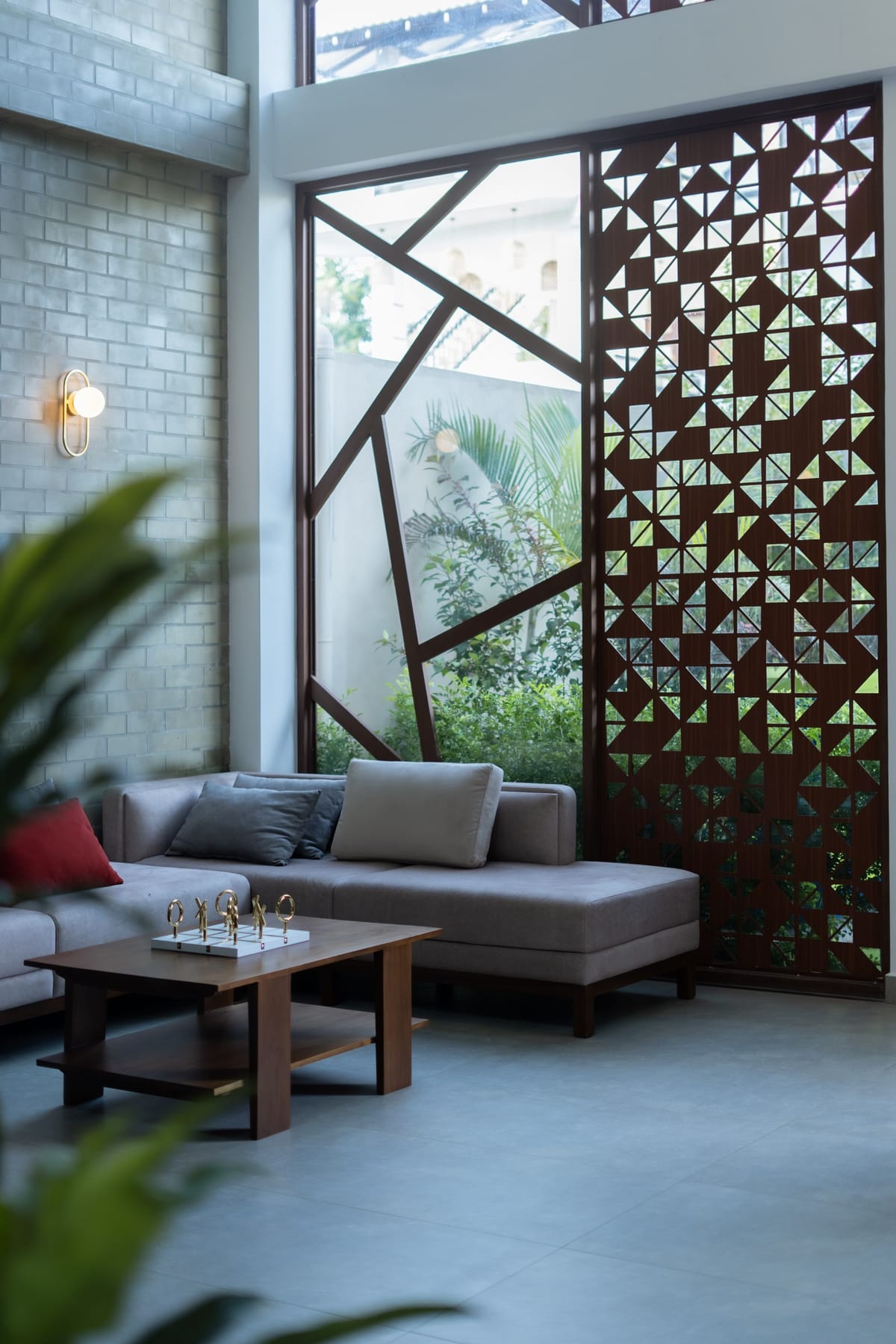 The lounge bathed in light behind the openwork screen